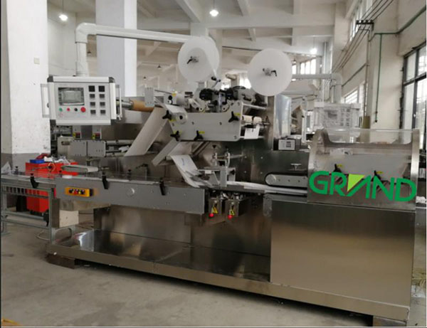 M&aacute;quina de dobrar e embalagem molhada