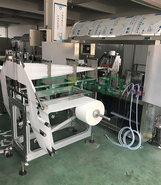 M&aacute;quina de embalagem de tecido &uacute;mido